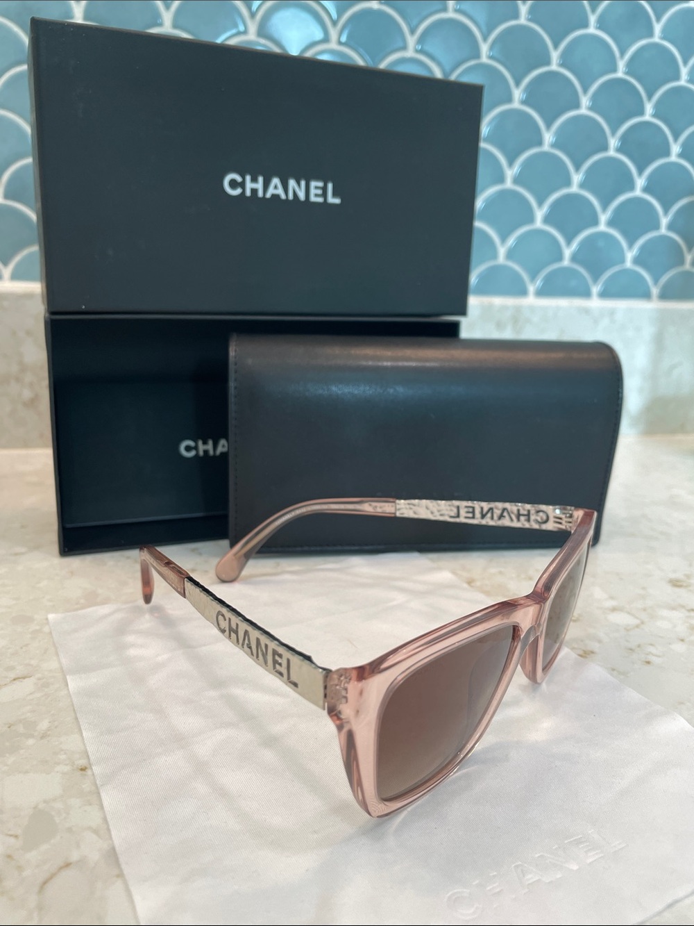 CHANEL Translucent Pink Square Sunglasses with Silver Logo Arms